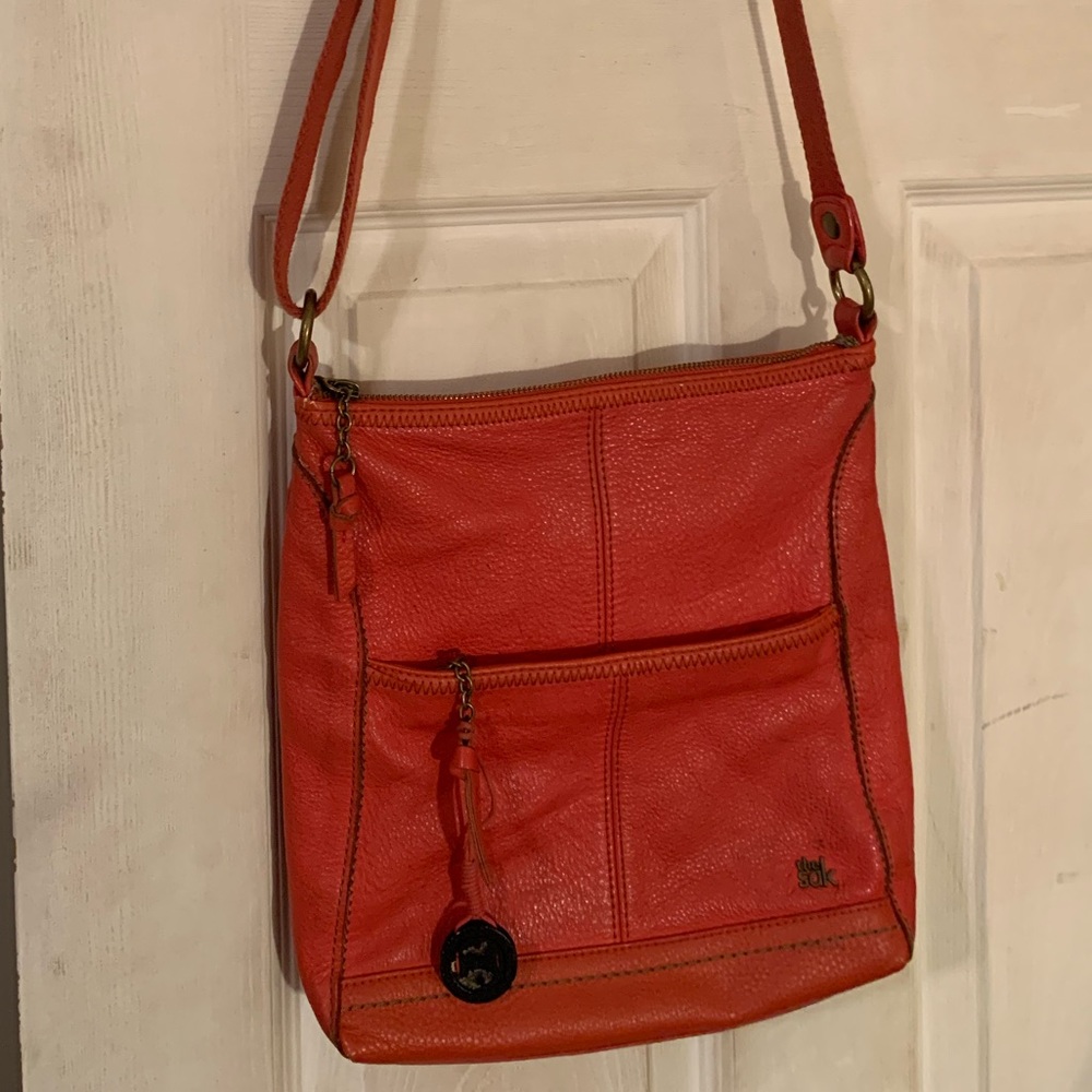 The Sak Orange Crossbody Bag with Adjustable Strap